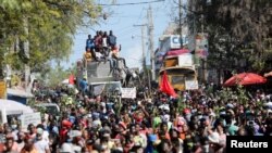 Warga Haiti melakukan protes menentang situasi ekonomi, politik dan sosial negara mereka yang tidak stabil di Port-au-Prince, Haiti, 17 Februari 2022. (Foto: REUTERS/Ralph Tedy Erol)