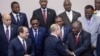 FILE - Russian President Vladimir Putin , center, shakes hands with South African President Cyril Ramaphosa, right, prior to a photo with heads of countries taking part in the 2019 Russia-Africa Summit in Sochi, Oct. 24, 2019. 
