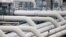 FILE - Pipes are pictured at a gas compressor station in Mallnow, Germany, Nov. 1, 2021.