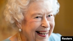 Reaksi Ratu Elizabeth saat menghadiri resepsi di Ballroom of Sandringham House yang merupakan kediaman Ratu Norfolk. (Foto: Joe Giddens via REUTERS)