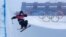 Britain's Gus Kenworthy falls during the men's halfpipe finals at the 2022 Winter Olympics, Saturday, Feb. 19, 2022, in Zhangjiakou, China.