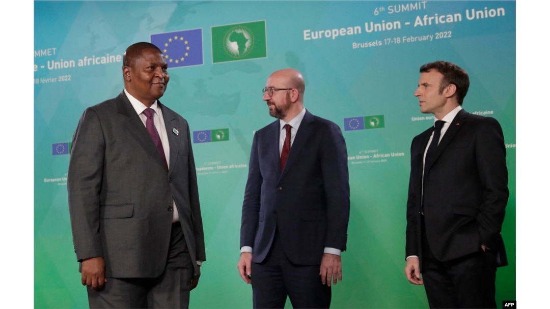 FILE - Central African Republic's President Touadera is welcomed by President of the European Council Charles Michel (C) and French President Macron during an EU-AU summit in Brussels, Feb. 17, 2022. summit in Brussels, Feb. 17, 2022.