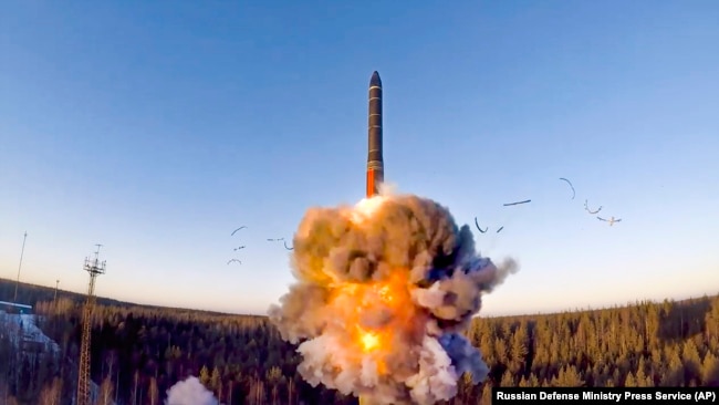 FILE - In this photo from the Russian Defense Ministry Press Service, on Dec. 9, 2020, a ground-based intercontinental ballistic missile was launched in northwestern Russia
