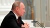 ماسکو: صدر پوٹن کریملن میں سیکیورٹی کونسل کے اجلاس کی صدارت کرتے ہوئے۔ 21 فروری 2022ء