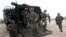 FILE - U.S. soldiers land with an amphibious assault vehicle on the beachhead during U.S.-Thai "Cobra Gold" joint military exercises on Hat Yao beach in Chonburi province, eastern Thailand, Feb. 28, 2020.