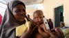 A Somali child is checked for malnutrition at a Save the Children clinic at their camp in Hodan district of Somalia's capital Mogadishu, Nov. 21, 2012.