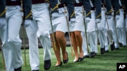 FILE - United States Military Academy graduating cadets march to their graduation ceremony of the U.S. Military Academy class 2021 at Michie Stadium on May 22, 2021, in West Point, N.Y. 