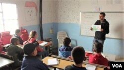 Displaced Kurdish children from Afrin learn their mother tongue Kurmanji