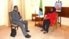 Tanzanian President Samia Suluhu Hassan, right, meets with opposition leader Tundu Lissu in Brussels, Belgium, Feb. 16, 2022, in this photo posted on Twitter by Tanzania's State House @ikulumawasliano.