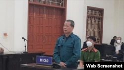 Ông Trần Quốc Khánh tại phiên sơ thẩm tháng 10/2021. Photo Dân Trí