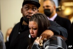 Daunte Wright's parents, Aubrey Wright and Katie Wright, react after former Brooklyn Center Police Officer Kim Potter was sentenced to two years in prison, Feb. 18, 2022 in Minneapolis.