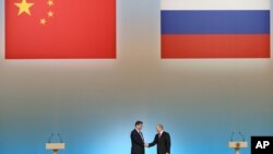 Ši Đinping i Vladimir Putin na ceremoniji otvaranja Olimpijskih igara u Pekingu