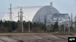 Гигантский защитный купол над разрушенным четвертым реактором Чернобыльской АЭС, 2021 г. 