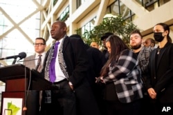 Attorney Ben Crump, along with the family of Daunte Wright, speaks with the media after former Brooklyn Center Police Officer Kim Potter was sentenced to two years in prison, Feb. 18, 2022, in Minneapolis.