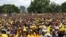 Members of Zimbabwe's opposition party the Citizens’ Coalition for Change at a rally in Harare, Feb. 20, 2022 which was held under strict conditions set by the police. (Columbus Mavhunga/VOA)