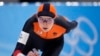 FILE- Sanne In 't Hof of the Netherlands competes in the women's speedskating 5,000-meter race at the 2022 Winter Olympics, in Beijing, Feb. 10, 2022. Starting in April, 2025, tickets for the 2026 Milan-Cortina Winter Olympics will be available to the general public.