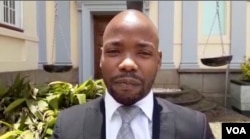 Noble Chinhanu of the Zimbabwe Human Rights NGO Forum successfully represented striking teachers in court on February 16, 2022 in Harare to have their suspension lifted. (Columbus Mavhunga/VOA)