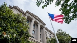 Gedung Departemen Kehakiman Robert F. Kennedy, Jumat, 19 Juni 2015, di Washington. (Foto: AP/Andrew Harnik)