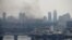 Smoke rises from the territory of the Ukrainian Defense Ministry's unit, after Russian President Vladimir Putin authorized a military operation in eastern Ukraine, in Kyiv, Feb. 24, 2022. 