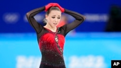 Kamila Valieva, 15, of the Russian Olympic Committee, reacts after the women's team free skate program at the 2022 Winter Olympics, Feb. 7, 2022, in Beijing.