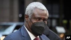 FILE - African Union commission chairperson Mahamat Moussa Faki arrives for an EU Africa summit in Brussels, Friday, Feb. 18, 2022. EU leaders held an extraordinary meeting in Brussels on the Ukraine and Russia situation, ahead of a meeting with African Union leaders.