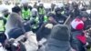 Scuffles in Ottawa as Police Push to Break Up Protests 