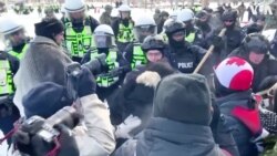 Scuffles in Ottawa as Police Push to Break Up Protests 