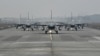 FILE - US-made F-16V fighters taxi on the runway at an air force base in Chiayi, southern Taiwan, Jan. 5, 2022. 