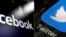 FILE - This combination of photos shows logos for social media platforms Facebook and Twitter. 