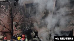 Sebuah jet tempur Iran yang jatuh, di Tabriz, Iran, 21 Februari 2022. (Foto: via Reuters)