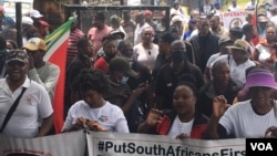 Members of Put South Africans First protesting in Hillbrow, South Africa, on Saturday, February 19, 2022. (Thuso Khumalo)