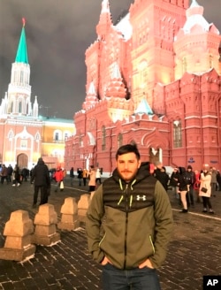 This 2018 image provided by the Reed family shows Trevor Reed at Red Square in Moscow, Russia. Russia is holding Marine veteran Reed, who was sentenced to nine years on charges he assaulted a police officer.