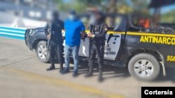 La Fiscalía de Delitos de Narcoactividad en coordinación con unidades especiales de investigación de la Policía Nacional Civil de Guatemala capturaron a Otto Fernando Godoy Cordón, el 20 de febrero de 2022. [Cortesía Ministerio Público de Guatemala].