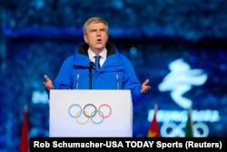 FILE - IOC president Thomas Bach speaks during the closing ceremony for the Beijing 2022 Olympic Winter Games at Beijing National Stadium, Feb. 20, 2022.