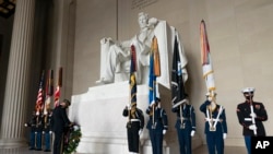 An honor cordon is in place during a Presidential Full Honor Wreath-Laying Ceremony at the Lincoln Memorial in Washington in honor of Abraham Lincoln on the 213th anniversary of his birth, Feb. 12, 2022, in Washington. 