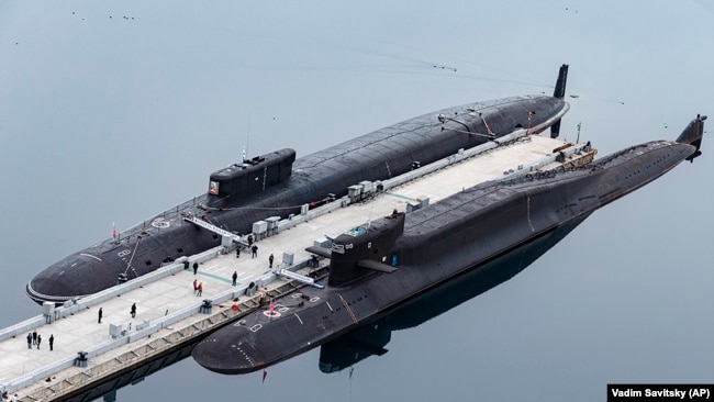 FILE - In this photo, Russian nuclear submarines are harbored at a Russian naval base in Gazhiyevo, Kola Peninsula, Russia, on April 13, 2021.