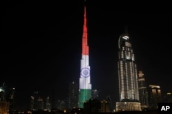 FILE - The Burj Khalifa, the world's tallest building, displays the flag of India in Dubai, United Arab Emirates, Feb. 10, 2018. during Indian Prime Minister Narendra Modi's visit to the UAE.