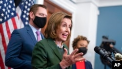 House Speaker Nancy Pelosi, D-Calif., with Rep. Eric Swalwell, D-Calif., and Rep. Barbara Lee, D-Calif., holds a news conference at the Capitol in Washington, Feb. 23, 2022, where she condemned Russian President Vladimir Putin for his aggression in Ukrain