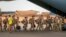 FILE - French Barkhane force soldiers who wrapped up a tour of duty in the Sahel leave their base on a transport plane in Gao, Mali, 6.9.2021. French President Emmanuel Macron announced at a press conference 2.17.2022 that he is withdrawing French troops from Mali.