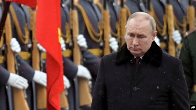 Russian President Vladimir Putin attends a wreath-laying ceremony at the Tomb of the Unknown Soldier. (Alexei Nikolsky, Kremlin Pool Photo via AP)