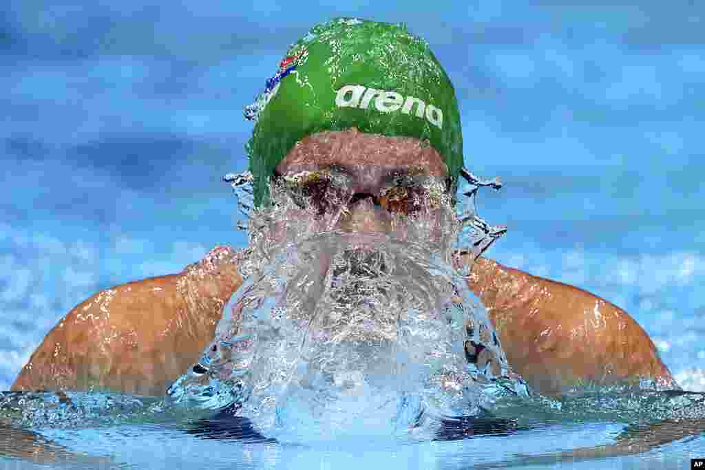 Tatjana Schoenmaker of South Africa swims in a women&#39;s 200-meter breaststroke semifinal at the 2020 Summer Olympics, Thursday, July 29, 2021, in Tokyo, Japan. (AP Photo/Matthias Schrader)