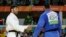 Egypt's Islam El Shehaby, blue, declines to shake hands with Israel's Or Sasson, white, after losing during the men's over 100-kg judo competition at the 2016 Summer Olympics in Rio de Janeiro, Brazil, Aug. 12, 2016.