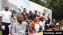 FILE - Aslam Longton (bottom right) and amil Longton (bottom left) are seen at Kenya National Human Rights Commission in Nairobi, Feb. 2, 2025. (Credit: Kenya National Human Rights Commission)