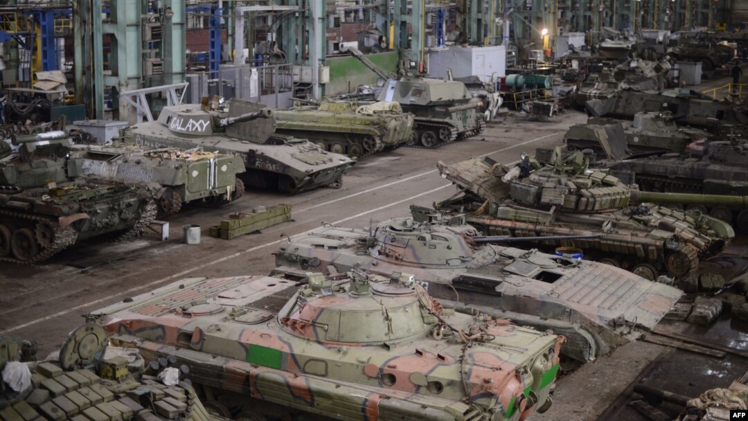 A General view taken on March 12, 2015 shows a tank repair workshop in the rebel stronghold of Donetsk. 