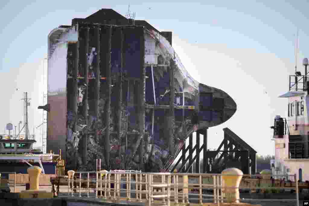 The bow section of the vehicle carrier Golden Ray, with some of the 4,000 cars still onboard, waits to be towed to a scrap yard in Brunswick, Ga., Dec. 1, 2020. The vessel capsized while sailing outbound from the Port of Brunswick on Sept. 8, 2019.