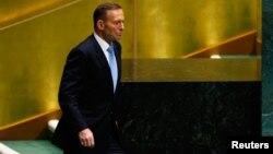 FILE - Tony Abbott, Prime Minister of Australia, prepares to address the 69th United Nations General Assembly at the U.N. headquarters in New York. Sept. 25, 2014. 