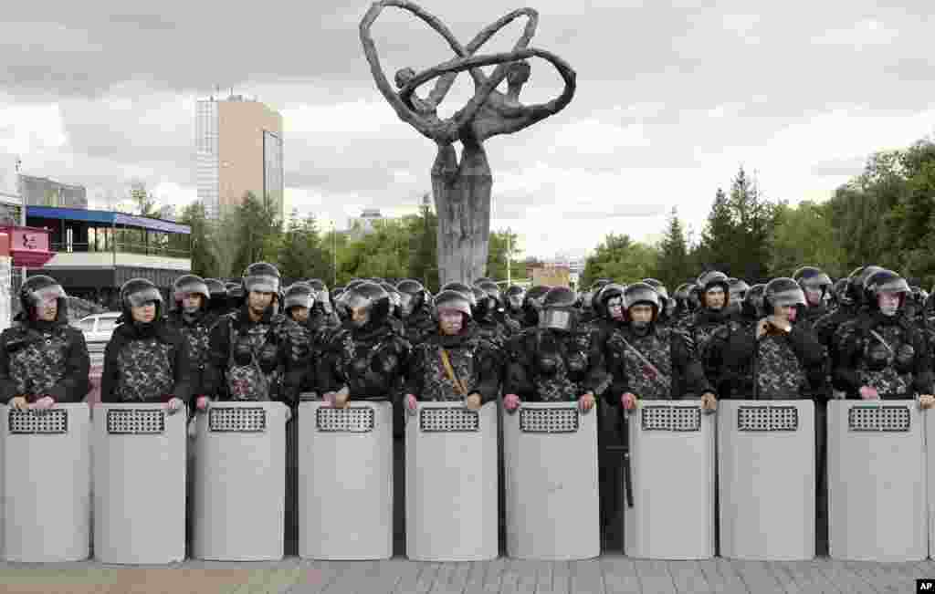 Kazakh police block an area to prevent protests against presidential elections in Nur-Sultan, the capital city of Kazakhstan.