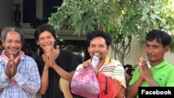 Ouch Leng (third from the left), Goldman Environmental Prize 2016 and three other environmental activists are released after being detained for four days. (Courtesy photo of CCHR) 