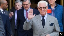 FILE - Roger Stone, an associate of President Donald Trump, leaves the U.S. District Court, after a court status conference on his seven charges: one count of obstruction of an official proceeding, five counts of false statements, and one count of witness tampering.
