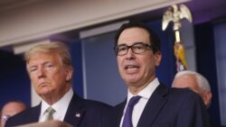 U.S. President Donald Trump and Treasury Secretary Steven Mnuchin answer questions during the Trump administration?s daily coronavirus briefing at the White House in Washington, U.S., March 17, 2020. REUTERS/Jonathan Ernst